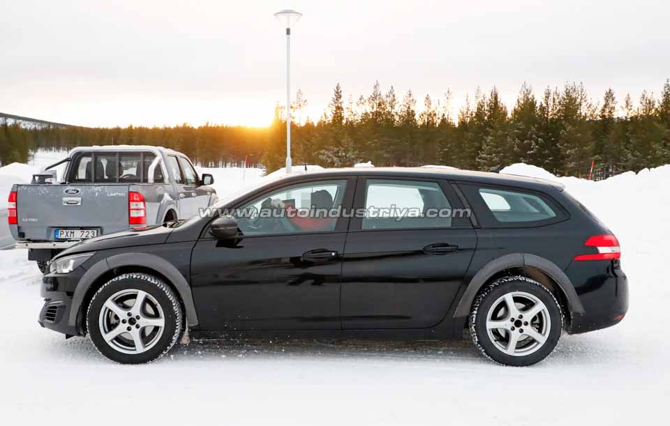 The side profile of the 2018 Peugeot 508 test mule
