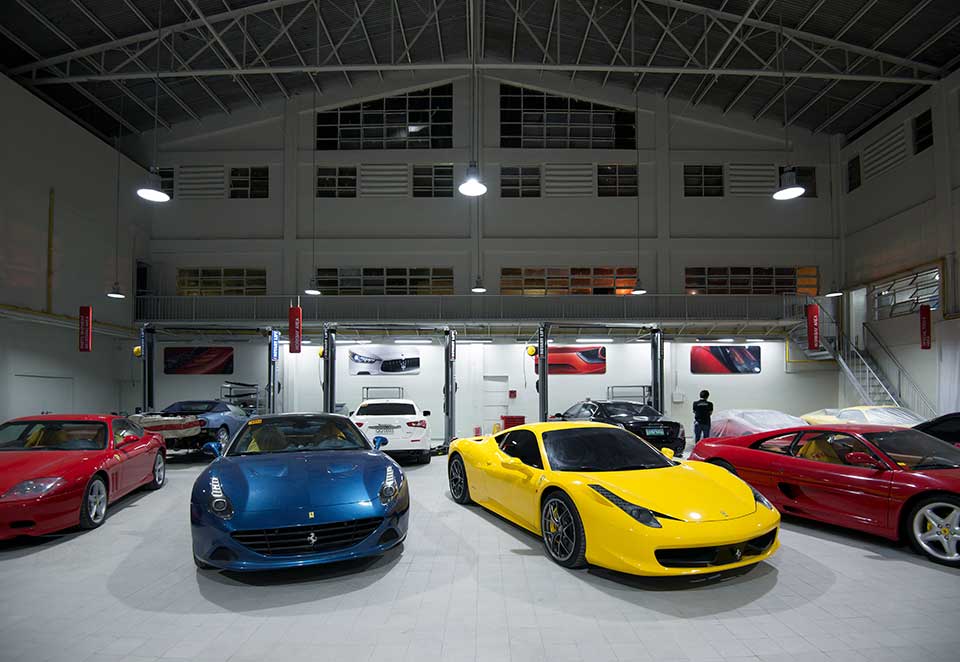 The different Ferraris and Maseratis currently being serviced at the new service center