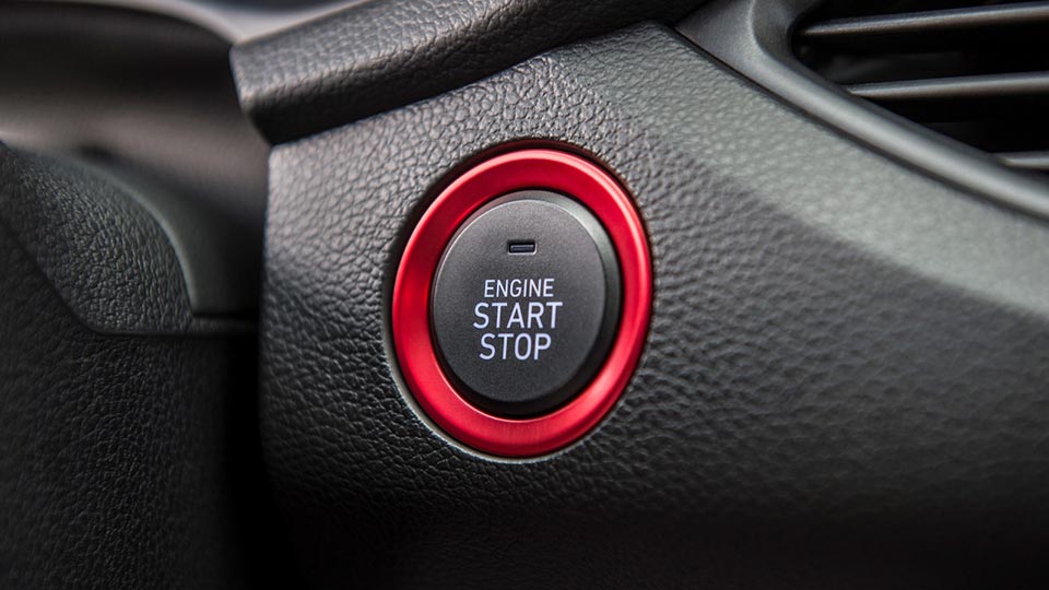 The red surround on the engine start/stop button on the 2018 Elantra GT