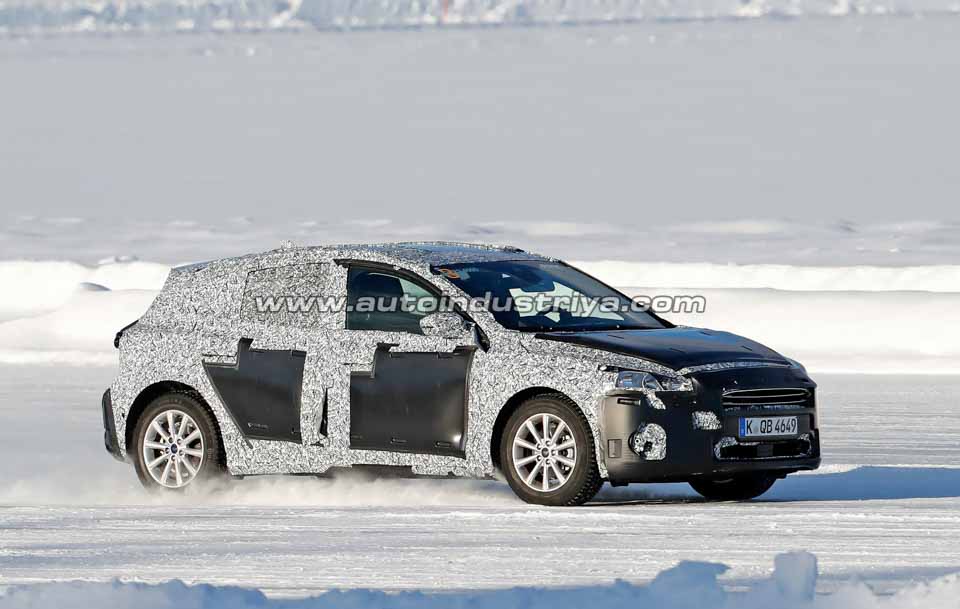 Spied: Fourth-gen Ford Focus spotted with production body
