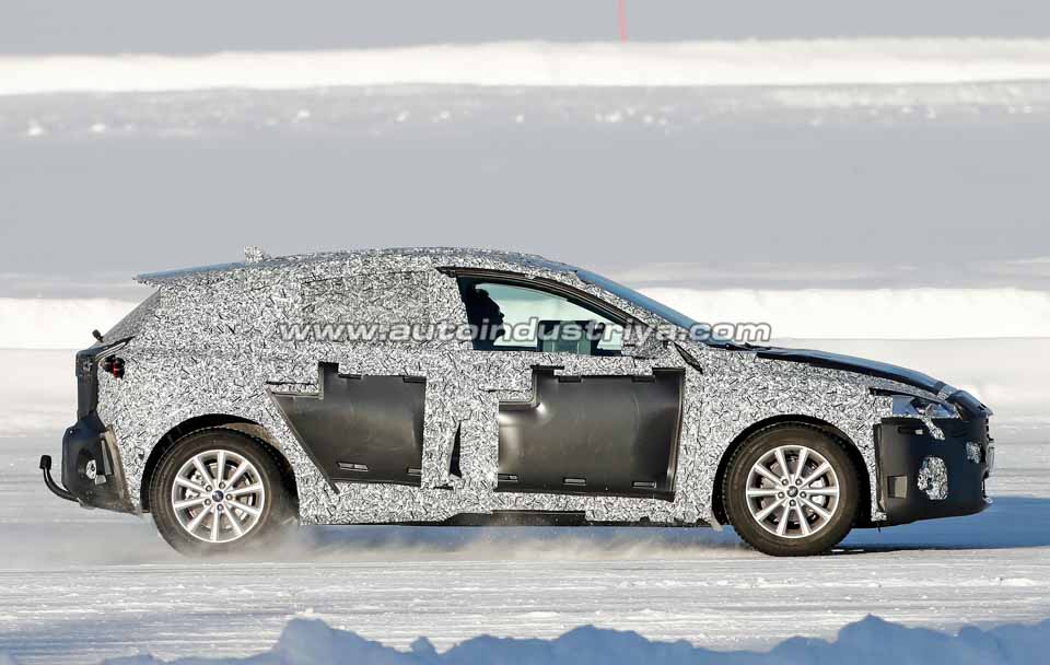 Spied: Fourth-gen Ford Focus spotted with production body