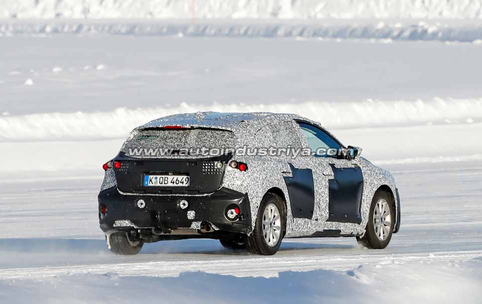 Spied: Fourth-gen Ford Focus spotted with production body