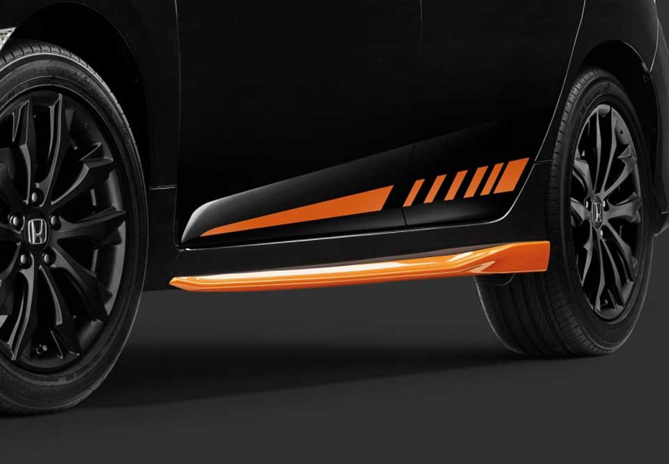 The eye-catching orange stripes on the Orange Edition Civic Hatchback