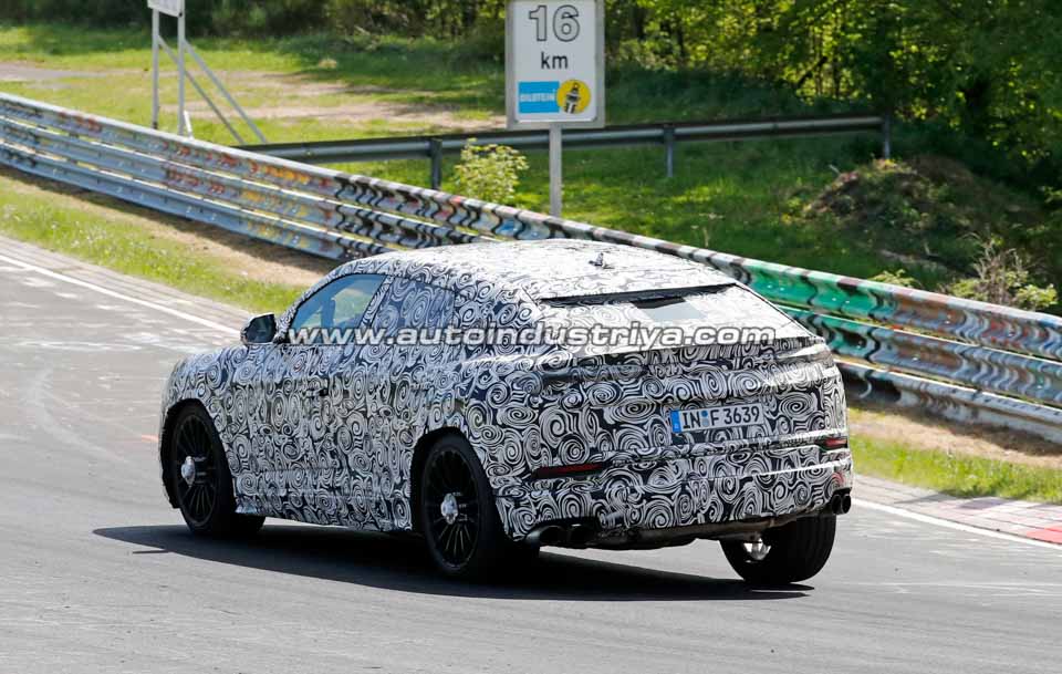 The Lamborghini Urus showing some body roll around a corne
