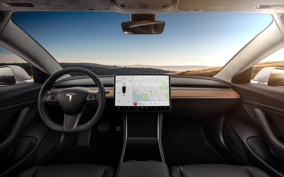Base model 2018 Tesla Model 3 makes world debut