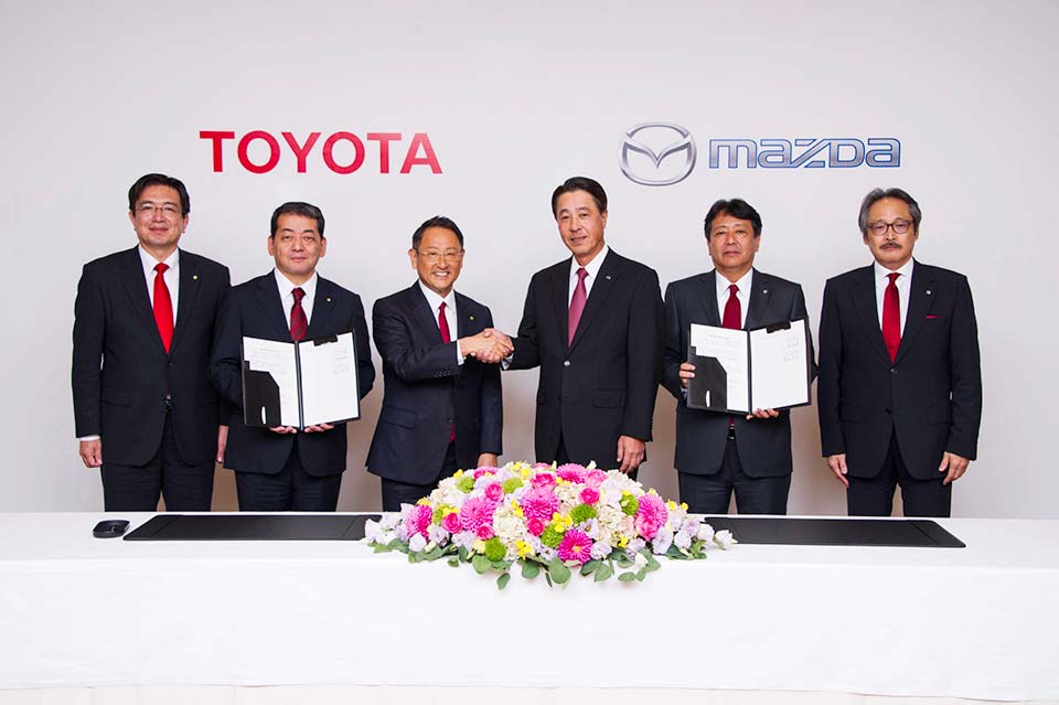 Toyota and Mazda forge business and capital partnership Toyota and Mazda forge business and capital partnership