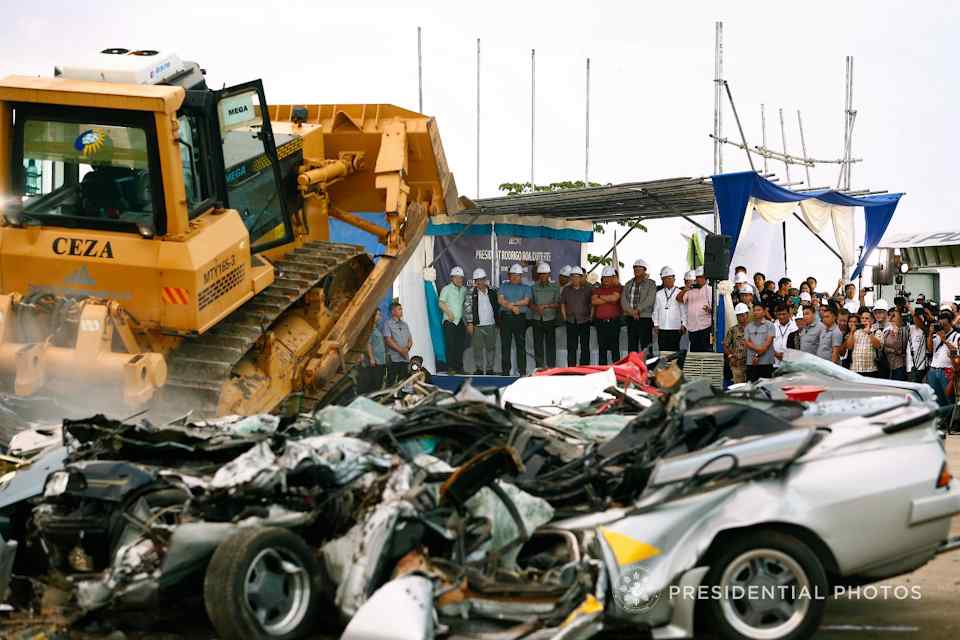 Smuggled cars meet their crushing fate in Port Irene