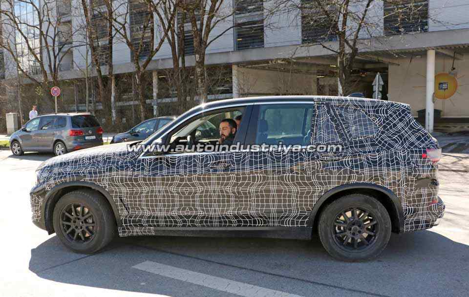 Spied: Lightly-camo'd BMW X5 seen inside and out