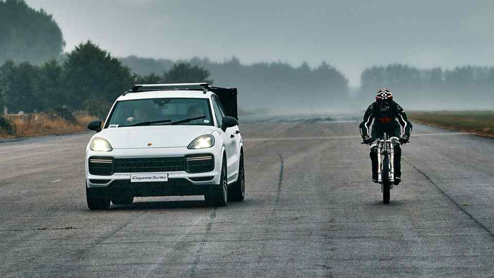 Break a bicycle land speed record with the help of Porsche