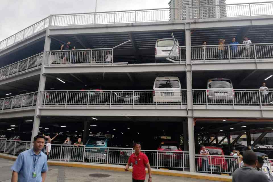 Man drives MPV off Greenhills Promenade parking building Man drives MPV off Greenhills Promenade parking building